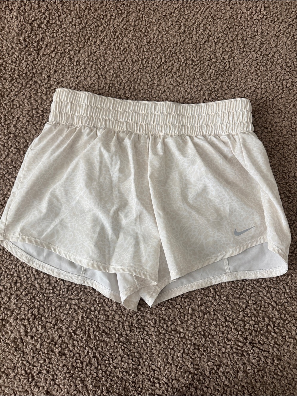 Nike Women's Cream-White Running Shorts with Subtle Print